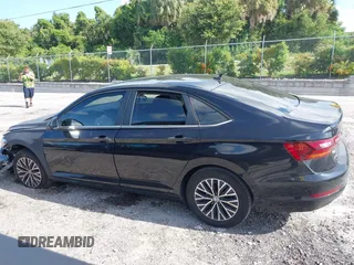 2019 Volkswagen Jetta SEL with VIN 3VWEB7BU7KM193642, listed as a IAAI auction lot 42718572 with 124,633 mi miles and . Bid and sale history available at DreamBid. Image 14.