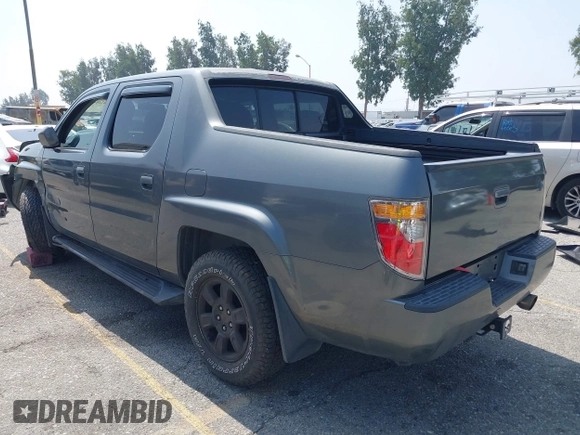 2007 Honda Ridgeline RTL with VIN 2HJYK16547H502601, listed as a IAAI auction lot 42484634 with 197,253 mi miles and . Bid and sale history available at DreamBid. Image 3.