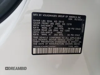 2024 Volkswagen Atlas SE с VIN 1V2DE2CA0RC244941, выставлен на аукционе Copart как лот 84553054 с пробегом 9 миль миль и Списание • Salvage title. История ставок и продаж доступна на DreamBid. Изображение 13.
