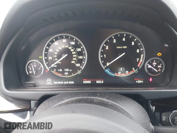 2014 BMW X5 xDrive50i with VIN 5UXKR6C59E0C03597, listed as a IAAI auction lot 41866944 with 65,890 mi miles. Bid and sale history available at carsss.com. Image 7.
