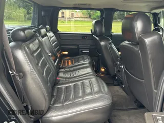 2005 Hummer H2 SUT z VIN 5GRGN22U15H123289, wystawiony jako Copart lot #55254575 z przebiegiem 161 105 mil mil oraz Tytuł czysty. Historia ofert i sprzedaży dostępna na DreamBid. Obrazek 6.
