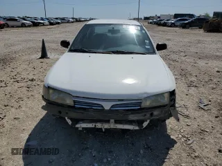 1998 Mitsubishi Mirage DE z VIN JA3AY26A1WU025398, wystawiony jako Copart lot #52533075 z przebiegiem 111 206 mil mil oraz Szkoda całkowita • Salvage title. Historia ofert i sprzedaży dostępna na DreamBid. Obrazek 5.