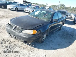 2004 Pontiac Grand Am SE with VIN 1G2NE52F74C226518, listed as a IAAI auction lot 41235829 with 215,862 mi miles. Bid and sale history available at carsss.com. Image 2.
