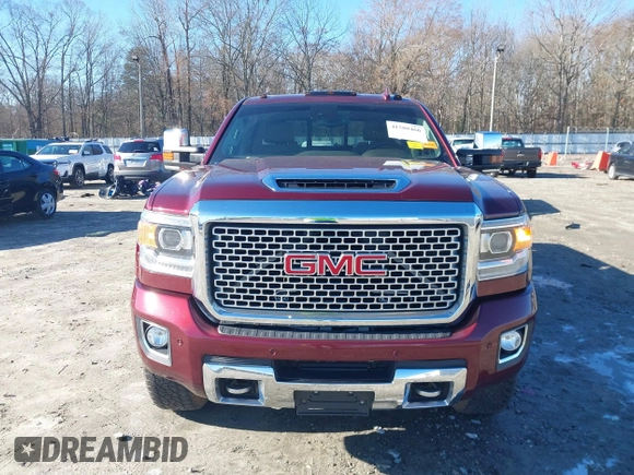 2017 GMC Sierra 2500HD Denali z VIN 1GT12UEY0HF186720, wystawiony jako IAAI lot #41580466 z przebiegiem Nie podano mil oraz . Historia ofert i sprzedaży dostępna na DreamBid. Obrazek 12.