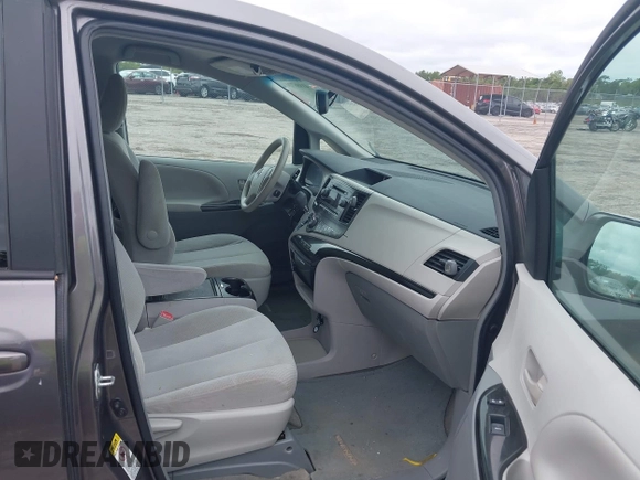 2014 Toyota Sienna LE AAS with VIN 5TDKK3DC9ES448461, listed as a IAAI auction lot 41986724 with 102,930 mi miles and . Bid and sale history available at carsss.com. Image 5.