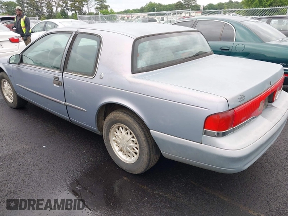 1995 Mercury Cougar z VIN 1MELM62W3SH600097, wystawiony jako IAAI lot #42185484 z przebiegiem 216 393 mil mil oraz . Historia ofert i sprzedaży dostępna na DreamBid. Obrazek 3.