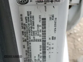 2017 Ford Fiesta SE с VIN 3FADP4BJ5HM140795, выставлен на аукционе Copart как лот 57097875 с пробегом 124 357 миль миль и Чистый • Clean title. История ставок и продаж доступна на DreamBid. Изображение 13.