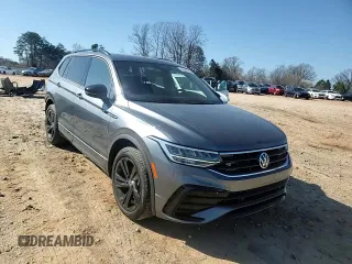 2023 Volkswagen Tiguan SE R-Line Black z VIN 3VVCB7AX7PM064170, wystawiony jako Copart lot #48539715 z przebiegiem 14 416 mil mil oraz Szkoda całkowita • Salvage title. Historia ofert i sprzedaży dostępna na DreamBid. Obrazek 11.
