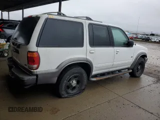 2000 Ford Explorer XLT z VIN 1FMZU73E2YZB82279, wystawiony jako Copart lot #86607864 z przebiegiem 46 620 mil mil oraz Szkody całkowita. Historia ofert i sprzedaży dostępna na DreamBid. Obrazek 3.