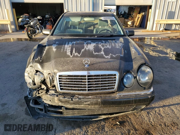 1999 Mercedes-Benz E-Class with VIN WDBJF82H9XX026911, listed as a Copart auction lot 48808835 with 205,953 mi miles and Salvage Title. Bid and sale history available at carsss.com. Image 5.