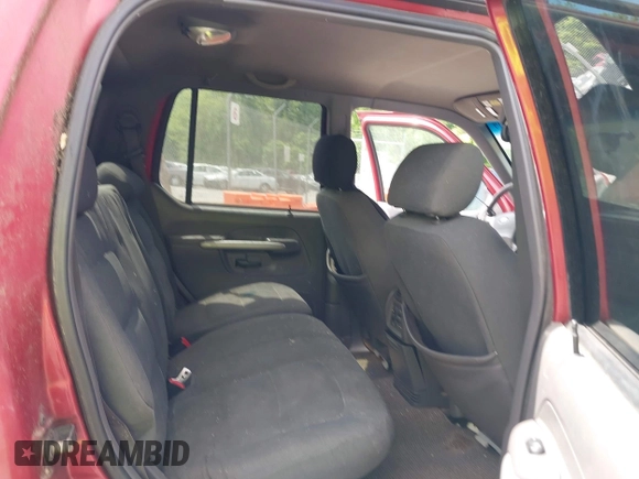 2001 Ford Explorer Sport Trac z VIN 1FMZU77E71UB98216, wystawiony jako IAAI lot #42296477 z przebiegiem 247 180 mil mil oraz . Historia ofert i sprzedaży dostępna na DreamBid. Obrazek 8.
