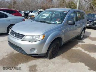 2007 Mitsubishi Outlander ES with VIN JA4MS31X67U003250, listed as a IAAI auction lot 41429499 with 134,016 mi miles. Bid and sale history available at carsss.com. Image 2.