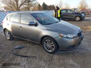 2011 Kia Forte 5-Door EX with VIN KNAFU5A28B5397178, listed as a IAAI auction lot 41531865 with 142,779 mi miles. Bid and sale history available at carsss.com. Image 1.