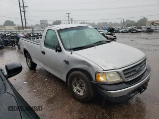 2000 Ford F-150 XL with VIN 1FTRF18L6YNA08144, listed as a Copart auction lot 66935914 with 281,348 mi miles and Non repairable. Bid and sale history available at DreamBid. Image 4.