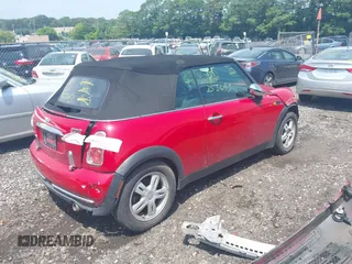 2006 MINI Convertible z VIN WMWRF33546TG13986, wystawiony jako IAAI lot #42634138 z przebiegiem Nie podano mil oraz . Historia ofert i sprzedaży dostępna na DreamBid. Obrazek 4.