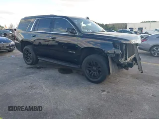 2019 Chevrolet Tahoe LT z VIN 1GNSKBKC4KR272918, wystawiony jako IAAI lot #41322220 z przebiegiem 186 883 mil mil oraz . Historia ofert i sprzedaży dostępna na DreamBid. Obrazek 1.