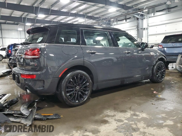 2021 MINI Clubman Cooper S with VIN WMWXJ1C05M2P49901, listed as a Copart auction lot 83023554 with 49,357 mi miles and Salvage Title. Bid and sale history available at carsss.com. Image 3.