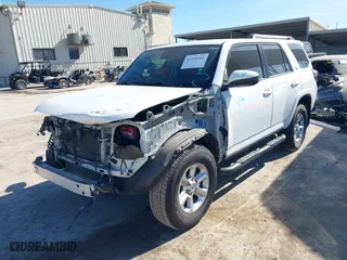 2022 Toyota 4Runner SR5 with VIN JTEEU5JR9N5261301, listed as a IAAI auction lot 41390561 with 36,627 mi miles. Bid and sale history available at carsss.com. Image 2.