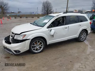 2013 Dodge Journey R/T with VIN 3C4PDDEG0DT651153, listed as a IAAI auction lot 41724885 with 133,391 mi miles and . Bid and sale history available at DreamBid. Image 2.