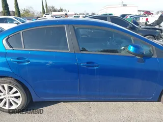 2012 Honda Civic EX with VIN 2HGFB2F88CH512765, listed as a IAAI auction lot 41591583 with 147,261 mi miles and . Bid and sale history available at DreamBid. Image 13.