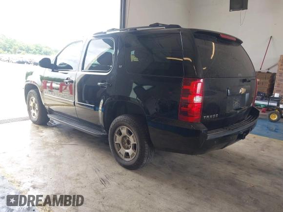 2007 Chevrolet Tahoe LT with VIN 1GNFC13037J129669, listed as a IAAI auction lot 42421808 with 268,523 mi miles and . Bid and sale history available at DreamBid. Image 3.