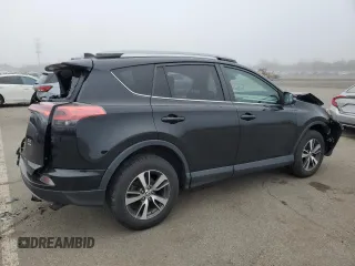 2018 Toyota RAV4 XLE with VIN 2T3RFREV8JW715099, listed as a Copart auction lot 51313485 with 140,107 mi miles and Salvage Title. Bid and sale history available at DreamBid. Image 3.