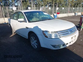 2009 Ford Taurus SE with VIN 1FAHP23W19G119583, listed as a IAAI auction lot 41667594 with 180,652 mi miles. Bid and sale history available at carsss.com. Image 1.