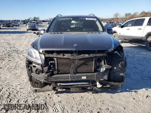 2016 Mercedes-Benz GL with VIN 4JGDF6EE0GA638059, listed as a Copart auction lot 83017144 with 168,505 mi miles and Salvage Title. Bid and sale history available at carsss.com. Image 5.