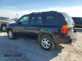 2005 GMC Envoy SLT with VIN 1GKDS13S352297652, listed as a Copart auction lot 41614205 with 71,937 mi miles and Salvage Title. Bid and sale history available at carsss.com. Image 2.