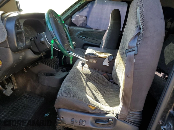 1999 Dodge Ram 2500 with VIN 1B7KC2368XJ548487, listed as a Copart auction lot 77256244 with 301,818 mi miles and Salvage Title. Bid and sale history available at carsss.com. Image 7.