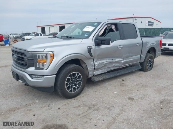 2023 Ford F-150 XL with VIN 1FTFW1E51PFB56848, listed as a IAAI auction lot 42067155 with 56,936 mi miles. Bid and sale history available at carsss.com. Image 17.