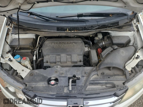 2014 Honda Odyssey Touring with VIN 5FNRL5H95EB083772, listed as a Copart auction lot 56713525 with 215,833 mi miles and Salvage title. Bid and sale history available at DreamBid. Image 12.