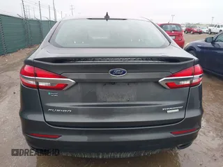 2020 Ford Fusion Titanium with VIN 3FA6P0K97LR192657, listed as a IAAI auction lot 42170258 with 87,696 mi miles and . Bid and sale history available at DreamBid. Image 17.