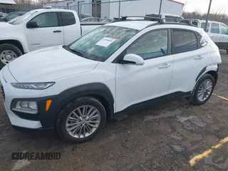 2021 Hyundai Kona SEL with VIN KM8K22AAXMU647635, listed as a IAAI auction lot 41656838 with 36,470 mi miles and . Bid and sale history available at DreamBid. Image 2.