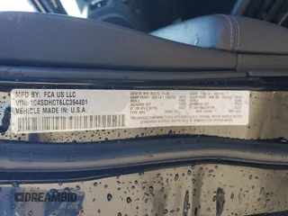 2020 Dodge Durango R/T z VIN 1C4SDHCT6LC394401, wystawiony jako Copart lot #87300014 z przebiegiem 64 519 mil mil oraz Szkoda całkowita • Salvage title. Historia ofert i sprzedaży dostępna na DreamBid. Obrazek 13.