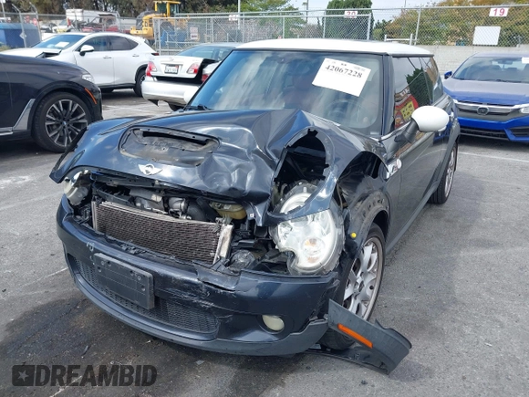 2007 MINI Hardtop S with VIN WMWMF73557TT80376, listed as a IAAI auction lot 42067228 with 174,262 mi miles and . Bid and sale history available at DreamBid. Image 17.