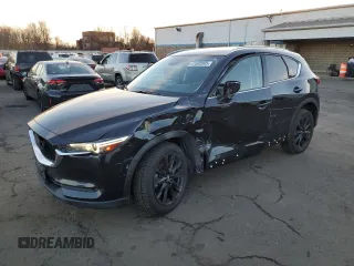 2021 Mazda CX-5 Grand Touring Reserve with VIN JM3KFBAY6M0309783, listed as a Copart auction lot 43549305 with 73,124 mi miles and Salvage Title. Bid and sale history available at carsss.com. Image 1.