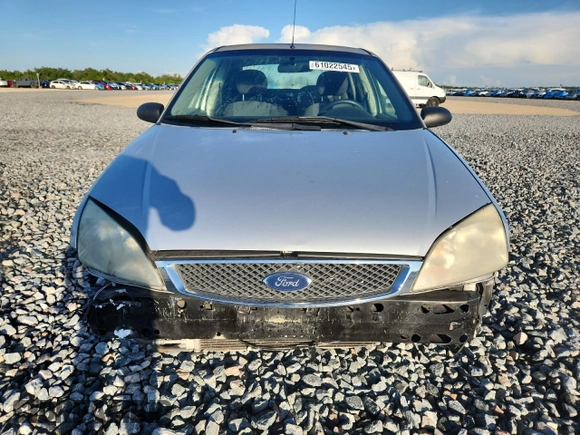 2007 Ford Focus S with VIN 1FAFP34N87W278008, listed as a Copart auction lot 61022545 with 139,575 mi miles and Salvage title. Bid and sale history available at DreamBid. Image 5.