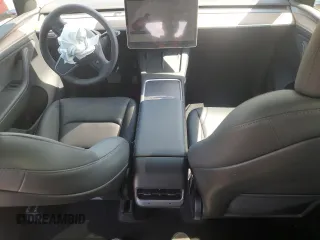 2024 Tesla Model Y Long Range z VIN 7SAYGDEE6RA261108, wystawiony jako Copart lot #55252805 z przebiegiem 16 932 mil mil oraz Szkoda całkowita • Salvage title. Historia ofert i sprzedaży dostępna na DreamBid. Obrazek 8.