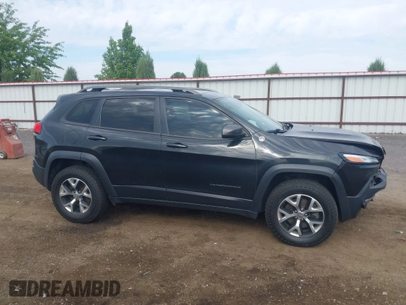 2016 Jeep Cherokee Trailhawk with VIN 1C4PJMBS4GW169267, listed as a IAAI auction lot 42597291 with 79,258 mi miles and . Bid and sale history available at DreamBid. Image 13.