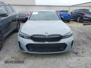 2024 BMW 3 Series 330i with VIN 3MW69FF04R8E41348, listed as a IAAI auction lot 42020955 with 23,395 mi miles. Bid and sale history available at carsss.com. Image 12.