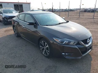 2016 Nissan Maxima SV with VIN 1N4AA6AP9GC384035, listed as a IAAI auction lot 42856838 with 116,736 mi miles and . Bid and sale history available at DreamBid. Image 1.