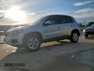 2013 Volkswagen Tiguan S with VIN WVGAV3AX2DW626571, listed as a Copart auction lot 60195355 with 100,324 mi miles and Salvage title. Bid and sale history available at DreamBid. Image 1.
