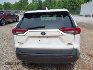 2020 Toyota RAV4 Hybrid XLE with VIN 2T3RWRFV5LW094731, listed as a IAAI auction lot 42349123 with 60,927 mi miles and . Bid and sale history available at DreamBid. Image 16.