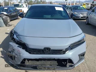 2024 Honda Civic Sport with VIN 2HGFE2F59RH562595, listed as a IAAI auction lot 41681632 with 18,217 mi miles and . Bid and sale history available at DreamBid. Image 12.