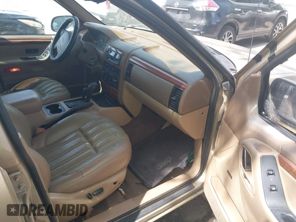 1999 Jeep Grand Cherokee Limited with VIN 1J4GW68S3XC580949, listed as a IAAI auction lot 42502949 with 150,520 mi miles and . Bid and sale history available at DreamBid. Image 5.
