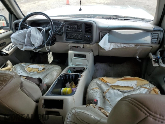 2002 GMC Yukon SLT z VIN 1GKEC13Z22R158811, wystawiony jako Copart lot #74568464 z przebiegiem Nie podano mil oraz Szkoda całkowita • Salvage title. Historia ofert i sprzedaży dostępna na DreamBid. Obrazek 8.