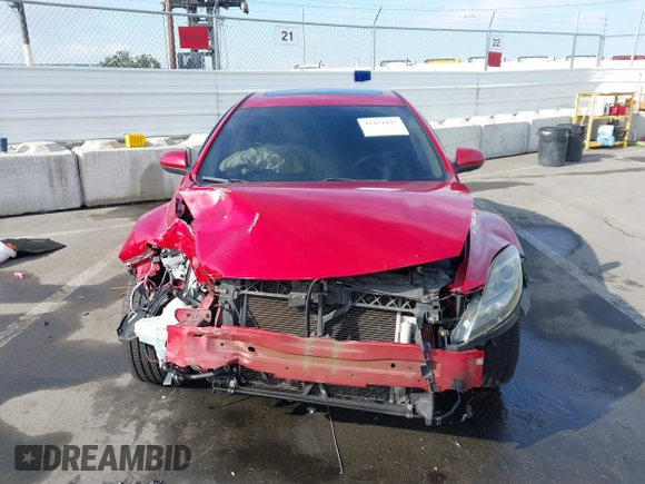2009 Mazda 6 S Grand Touring with VIN 1YVHP82B795M34101, listed as a IAAI auction lot 41434441 with 125,481 mi miles and . Bid and sale history available at DreamBid. Image 13.