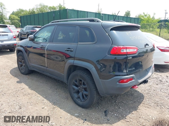 2014 Jeep Cherokee Trailhawk with VIN 1C4PJMBS8EW285276, listed as a IAAI auction lot 42408796 with Not provided miles and . Bid and sale history available at DreamBid. Image 3.
