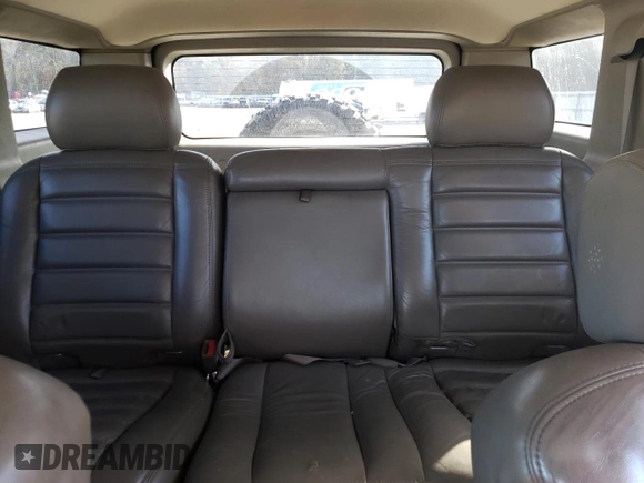 2003 Hummer H2 with VIN 5GRGN23U93H143561, listed as a Copart auction lot 79652984 with 247,206 mi miles and Clean Title. Bid and sale history available at carsss.com. Image 10.